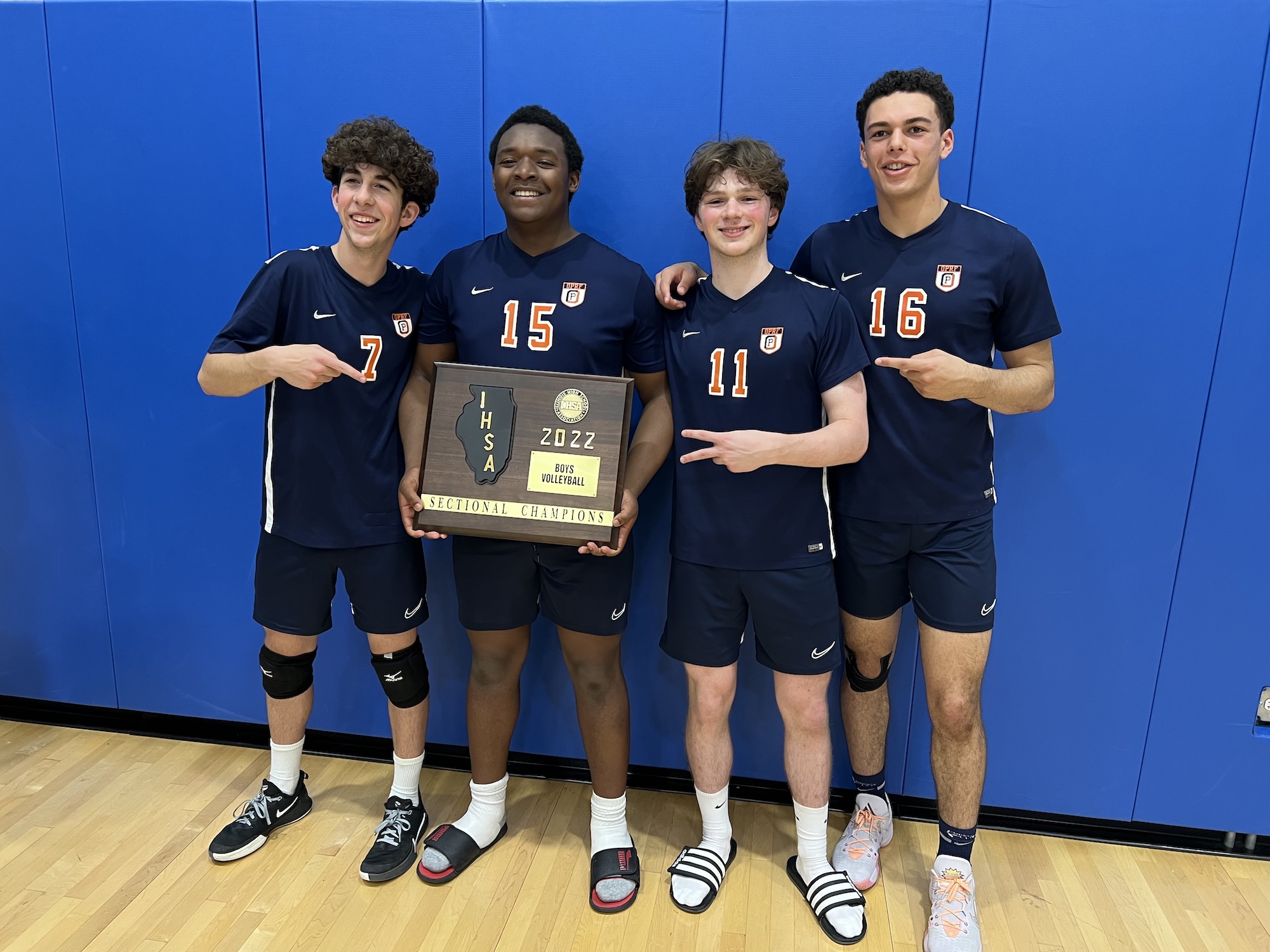 Danny and his senior high school teammates celebrating a sectional win
